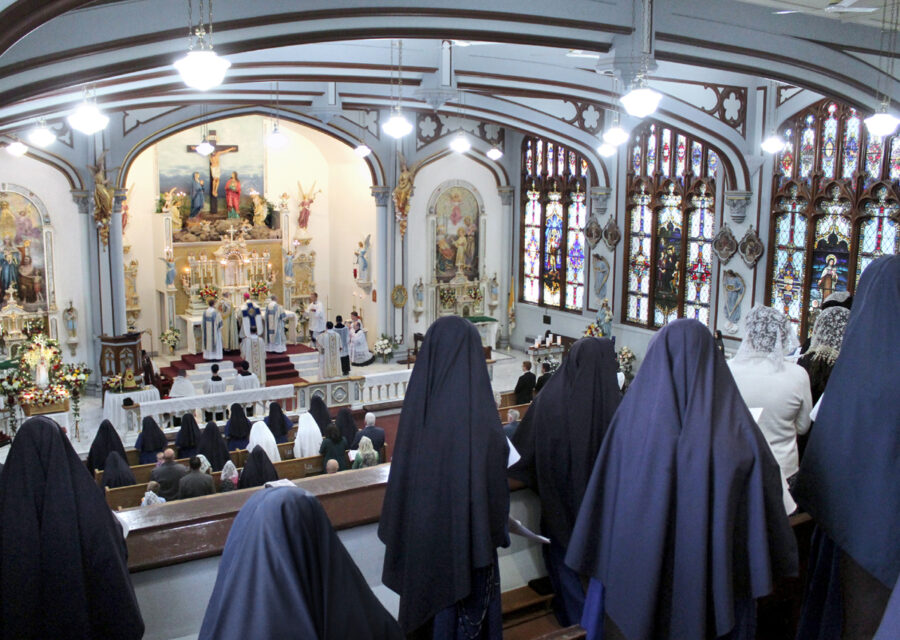 Sisters and students sing for the pontifical high Mass