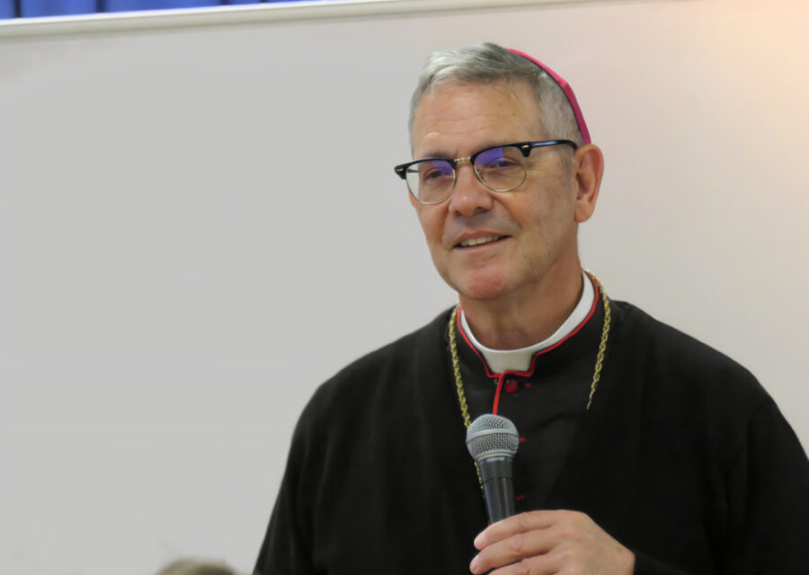 Bishop Pivarunas listens to a question from the audience.