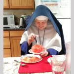 Is Sr Mary Imelda carving a small pumpkin? No, it’s a huge tomato!
