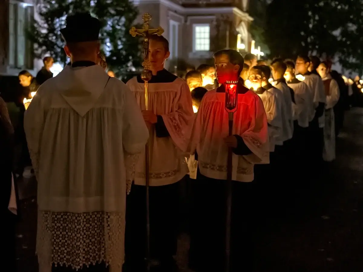 The Knights are given last-minute instructions for the Candlelight procession.