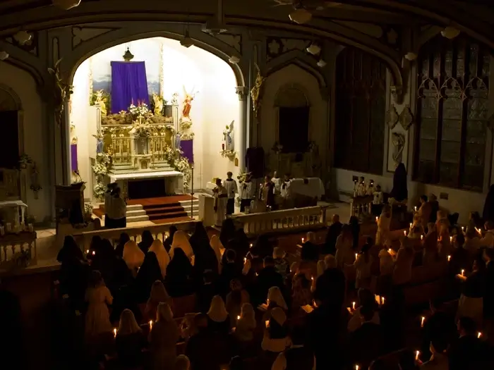 Chanting of the Exsultet during the Easter Vigil ceremonies at Mount St. Michael