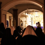 The Easter vigil ceremonies were held in the cloister chapel. Missed most were the large choir and the unveiling of the statues Father chants the Exultet in the convent chapel on Holy Saturday.