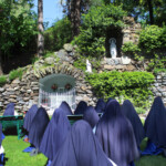 Of all Mothers the best! The Sisters honored Our Lady on Mother’s Day with the recitation of a “Living Rosary,” offering her flowers with our Aves. Living Rosary in the grotto on Mothers' Day