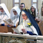 Sr. Mary Bridget renews her vows as part of the ceremony of her Golden Jubilee.