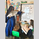 Sr. Mary Teresita gives a math lesson to the third graders of St. Philomena’s Academy in Middleville, Michigan.