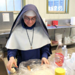 Sr. Bernardine Marie mixes the pretzel dough for the Sodality fundraiser supporting St. Francis Xavier Missionary Guild. Sr. Bernardine Marie mixes the pretzel dough.