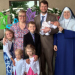 A Newly-Baptized Family with Their Sister Instructor