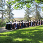 Carrying Our Queen in Procession