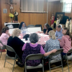 Sr. Mary Bernadette meets with parishioners who wish to help oversee church maintenance and repair.