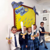 Students of St. Theresa’s School (Maine) learn more about the school theme and being “An Army of Youth” by getting to hold paper swords. An army of youth - with paper swords!