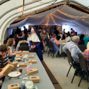 As one of the founding Sisters of Holy Guardian Angels Academy in Olathe, Rev. Mother was invited to join in their Silver Jubilee celebration. Reverend Mother visits with parishioners at the 25th anniversary celebration of Holy Guardian Angels Academy.