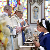 Bishop Pivarunas received the new postulants on the feast of the Divine Maternity.