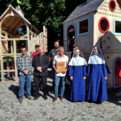 Fr. Letourneau, Sr. Mary Teresita and Sr. Maria Goretti with the owner of Cedar Works, who donated the new playground set for St. Theresa’s Church in Oakland, Maine.