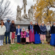 Sisters and parishioners of St. Theresa’s Catholic Church visit a cemetery during the month of November to pray for the Holy Souls.
