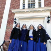 Our four New England missionaries in front of Our Lady of Mount Carmel Church in Salem, New Hampshire.