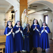 Sister Immaculata poses with our four other postulants after the reception ceremony.