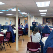 Fr. Benedict addresses Sodality members of Mary Immaculate Queen Church at their 10-year anniversary celebration. After several years of inactivity, the Sodality was resurrected in 2015.