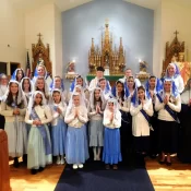 Many earnest lovers of Mary pose for a photo after the Sodality advancement at Mary Immaculate Queen Church in Rathdrum, Idaho.