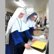 Sr. Helen Marie supervises a new order-filler at Mary Immaculate Queen Center in Spokane.