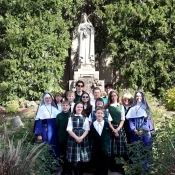 Students and teachers from St. Joseph’s of Wayne, Michigan, venerated the relics of St. Therese on her feastday when the reliquary was brought on tour to the U.S. This photo is taken on the grounds of the National Shrine of the Little Flower in Royal Oak, Michigan.