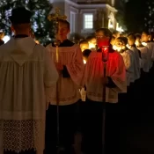 The Knights are given last-minute instructions for the Candlelight procession.