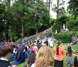 On the Feast of the Queenship, Sisters, students and parishioners of Mount St. Michael honored Our Blessed Mother with a Rosary procession to the grotto, where Fr. Casimir crowned Our Lady of Lourdes.