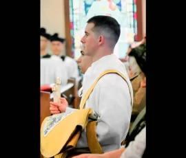 Rev. Anthony Alley and Rev. Lucas Oliveira kneel in the aisle before being called forth by the Bishop.