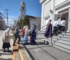 Parishioners at St. Theresa’s re-enter the Church at the conclusion of the Rogation procession. These processions are held on April 25th and the three days preceding the feast of the Ascension.
