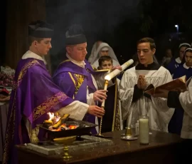 The lighting of the New Fire for the Easter Vigil takes place outside the main entrance at the Mount. Fr. Philip lights the Paschal candle with which he will lead the procession into the darkened church. Lumen Christi! Deo Gratias!